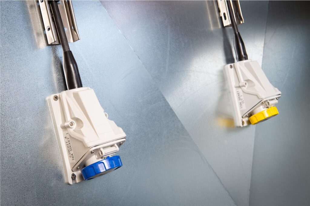 Electrical sockets inside white container