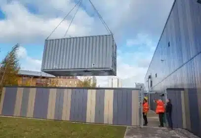 Grey-Container-Getting-Lifted-By-Crane