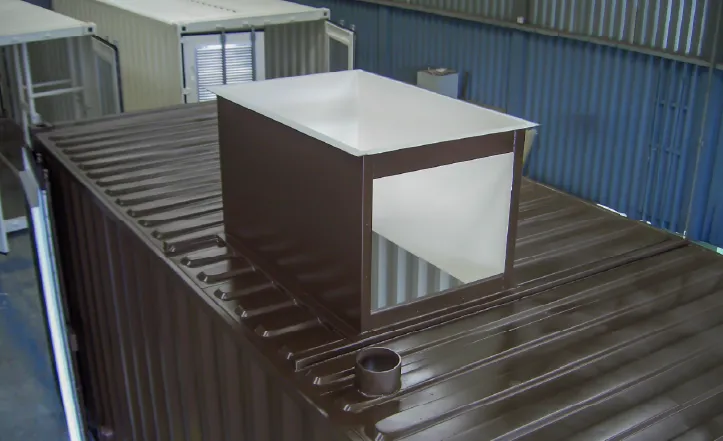 Top-down view of a container showing a square opening designed for fitting a boiler flue or chimney.