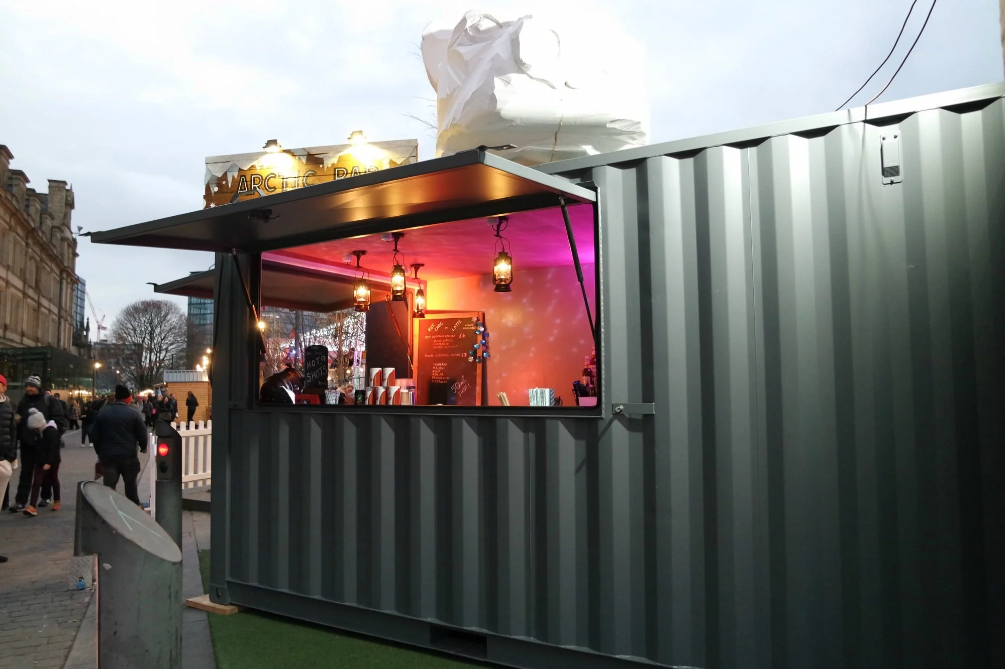 Container with bar hatch